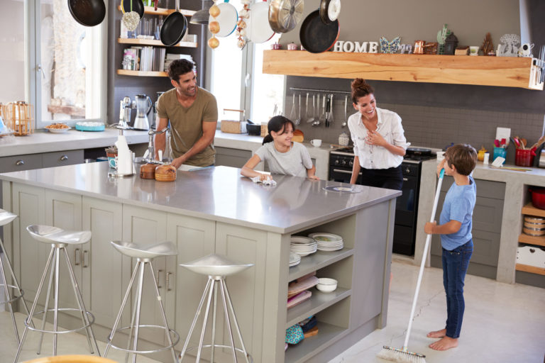 Children,Helping,Parents,With,Domestic,Chores,In,Kitchen