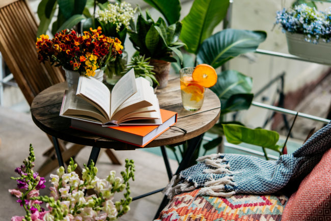 Reading,Books,In,Summer,At,A,Beautiful,Terrace,Or,Cozy